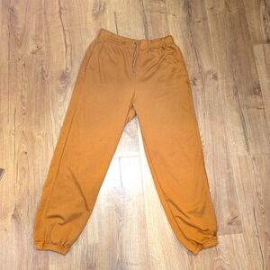 Comfortable Orange Joggers with Elastic Waistband and Cuffs‎